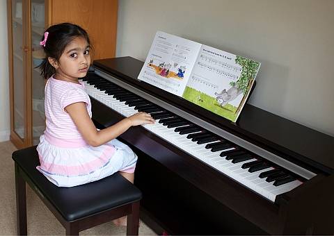 Image of Pinner girl with piano certificate